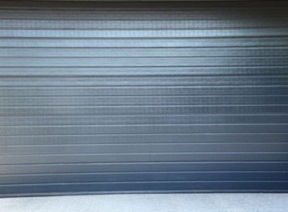 dark blue roller shutter door
