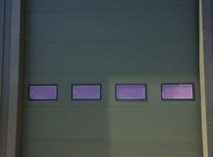 dark green roller shutter door